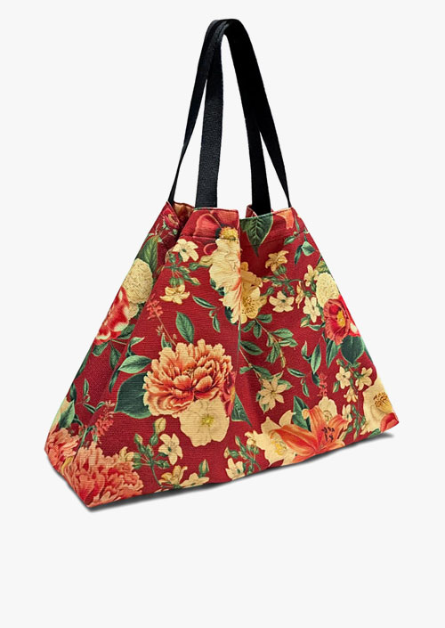 Large format bag, lined and with double closure, 100% cotton fabric. Floral design on maroon background